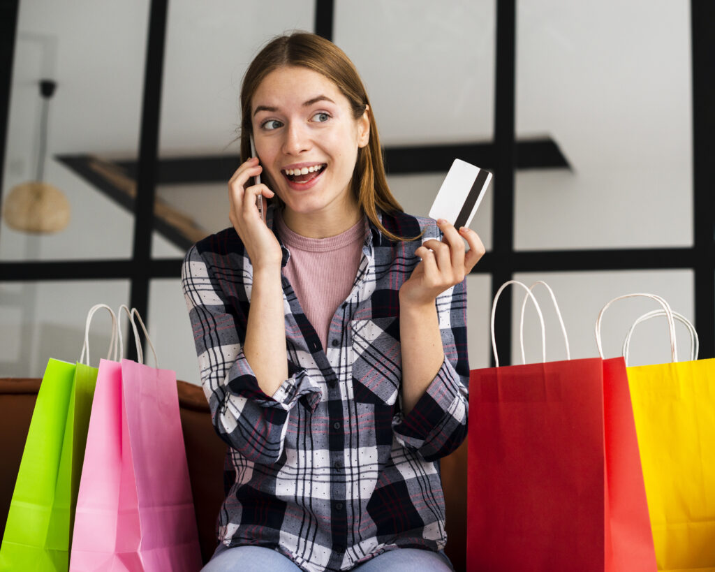 portrait-excited-woman-talking-phone